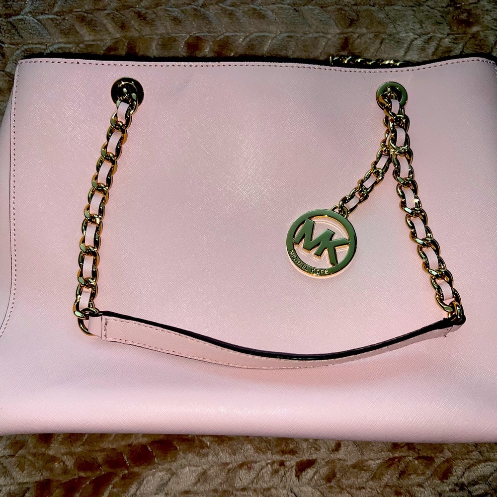 Gorgeous pink Michael Kors bag with gold chain accents